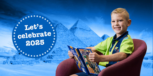 Photo of a student smiling holding a book. Text reads 'Let's celebrate 2025'.